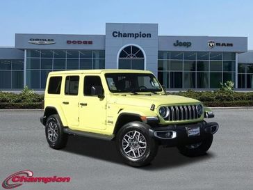 2024 Jeep Wrangler 4-door Sahara in a High Velocity Clear Coat exterior color and CLOTHinterior. Champion Chrysler Jeep Dodge Ram 800-549-1084 pixelmotiondemo.com 