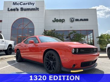 2023 Dodge Challenger R/T Scat Pack in a Go Mango exterior color and Blackinterior. McCarthy Jeep Ram 816-434-0674 mccarthyjeepram.com 
