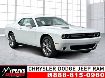 2023 Dodge Challenger SXT Awd in a White Knuckle exterior color and Blackinterior. McPeek's Chrysler Dodge Jeep Ram of Anaheim 888-861-6929 mcpeeksdodgeanaheim.com 