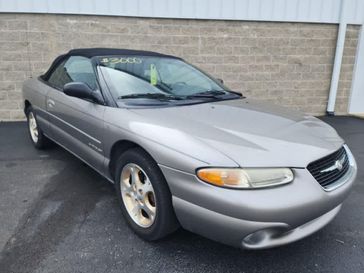 1999 Chrysler Sebring Jxi in a Silver Mist exterior color and Black/Grayinterior. Wilmington Auto Center Chrysler Dodge Jeep Ram (937) 556-6430 wilmingtonautocentercdjr.com 