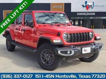 2024 Jeep Gladiator Sport S 4x4 in a Firecracker Red Clear Coat exterior color. Wischnewsky Dodge 936-755-5310 wischnewskydodge.com 