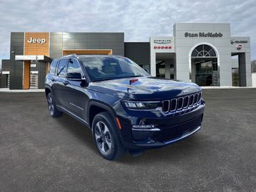 2024 Jeep Grand Cherokee 4xe in a Diamond Black Crystal Pearl Coat exterior color and Wicker Beige/Global Blackinterior. Stan McNabb Chrysler Dodge Jeep Ram FIAT 931-408-9662 