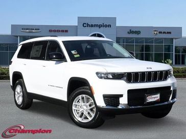 2024 Jeep Grand Cherokee L Laredo 4x2 in a Bright White Clear Coat exterior color and CLOTHinterior. Champion Chrysler Jeep Dodge Ram 800-549-1084 pixelmotiondemo.com 