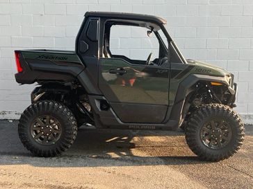 2024 Polaris XPEDITION XP 1000 Ultimate  in a Army Green exterior color. Plaistow Powersports (603) 819-4400 plaistowpowersports.com 