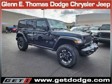 2024 Jeep Wrangler 4-door Rubicon X 4xe in a Black Clear Coat exterior color and Blackinterior. Glenn E Thomas 100 Years Of Excellence (866) 340-5075 getdodge.com 