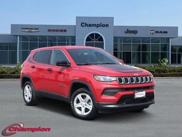 2023 Jeep Compass Sport 4x4 in a Redline Pearl Coat exterior color and CLOTHinterior. Champion Chrysler Jeep Dodge Ram 800-549-1084 pixelmotiondemo.com 