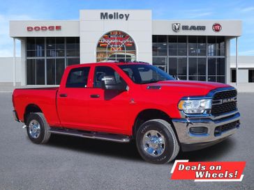 2024 RAM 3500 Tradesman Crew Cab 4x4 6'4' Box in a Flame Red Clear Coat exterior color and Blackinterior. Melloy Dodge RAM FIAT 505-588-4459 melloydodge.com 