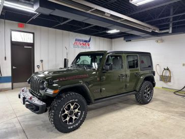 Used 2021 Jeep Wrangler Unlimited Rubicon in a Sarge Green Clear Coat exterior color and Blackinterior. Jensen Chrysler Dodge Jeep Ram 507-354-0542 jensenchryslerdodgejeepram.com 