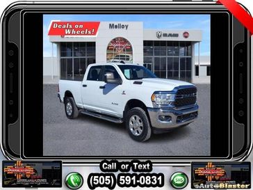 2023 RAM 2500 Big Horn in a Bright White Clear Coat exterior color and Diesel Gray/Blackinterior. Melloy Dodge RAM FIAT 505-588-4459 melloydodge.com 