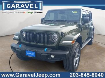 2024 Jeep Wrangler 4-door Sport S 4xe in a Sarge Green Clear Coat exterior color and Blackinterior. Garavel Jeep 475-258-7987 norwalkjeep.com 