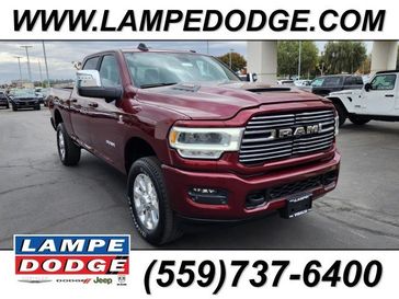 2024 RAM 2500 Laramie Crew Cab 4x4 6'4' Box in a Delmonico Red Pearl Coat exterior color and Blackinterior. Lampe Chrysler Dodge Jeep RAM 559-471-3085 pixelmotiondemo.com 