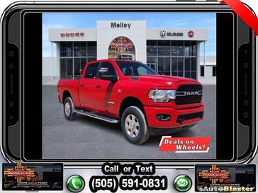 2024 RAM 2500 Big Horn Crew Cab 4x4 6'4' Box in a Flame Red Clear Coat exterior color and Blackinterior. Melloy Dodge RAM FIAT 505-588-4459 melloydodge.com 