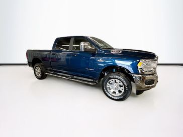 2024 RAM 2500 Laramie Crew Cab 4x4 6'4' Box in a Patriot Blue Pearl Coat exterior color and Blackinterior. Sheridan Motors Auto (307) 218-2217 sheridanmotors.com 