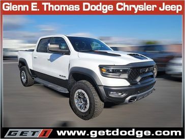 2021 RAM 1500 TRX in a Bright White Clear Coat exterior color and Blackinterior. Glenn E Thomas 100 Years Of Excellence (866) 340-5075 getdodge.com 