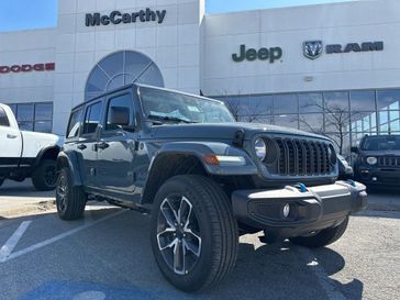 2024 Jeep Wrangler 4-door Sport S 4xe in a Anvil Clear Coat exterior color and Blackinterior. McCarthy Jeep Ram 816-434-0674 mccarthyjeepram.com 