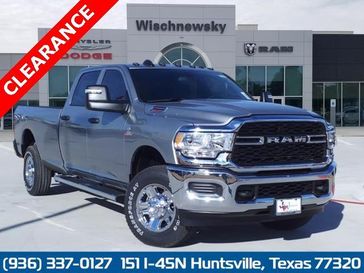 2024 RAM 2500 Tradesman Crew Cab 4x4 8' Box in a Billet Silver Metallic Clear Coat exterior color and Blackinterior. Wischnewsky Dodge 936-755-5310 wischnewskydodge.com 