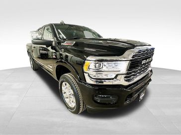 2024 RAM 2500 Limited Mega Cab 4x4 6'4' Box in a Diamond Black Crystal Pearl Coat exterior color and Blackinterior. Sheridan Motors CDJR 307-218-2217 sheridanmotor.com 