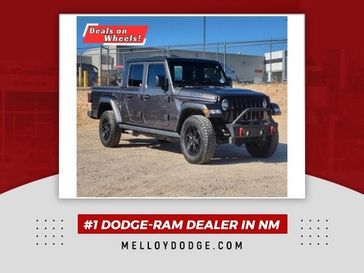 2021 Jeep Gladiator Sport in a Granite Crystal Metallic Clear Coat exterior color and Blackinterior. Melloy Dodge RAM FIAT 505-588-4459 melloydodge.com 