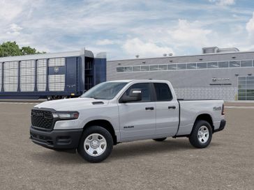New 2025 RAM 1500 Tradesman Quad Cab 4x4 6'4' Box in a Bright White Clear Coat exterior color. Kamaaina Motors 1-808-746-7956 kamaainamotors.com 