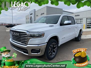 2025 RAM 1500 Laramie Crew Cab 4x4 5'7' Box in a Bright White Clear Coat exterior color and Blackinterior. Legacy Auto Center 620-315-9264 legacyautocenter.net 