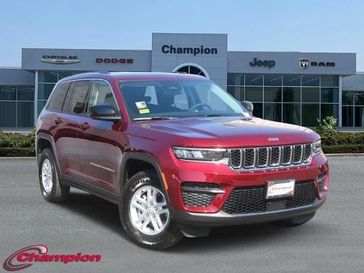2024 Jeep Grand Cherokee Laredo 4x2 in a Velvet Red Pearl Coat exterior color and CLOTHinterior. Champion Chrysler Jeep Dodge Ram 800-549-1084 pixelmotiondemo.com 