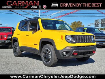 2023 Jeep Renegade Trailhawk 4x4 in a Solar Yellow Clear Coat exterior color and Black - D7X9interior. Carman Chrysler Jeep Dodge Ram 302-317-2378 carmanchryslerjeepdodge.com 