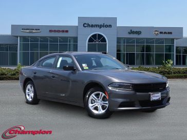 2023 Dodge Charger SXT Rwd in a Granite exterior color and HOUNDSTOOTHinterior. Champion Chrysler Jeep Dodge Ram 800-549-1084 pixelmotiondemo.com 