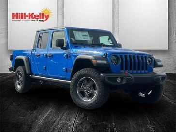 2023 Jeep Gladiator Rubicon 4x4 in a Hydro Blue Pearl Coat exterior color and Blackinterior. Hill-Kelly Dodge (850) 786-2130 hillkellydodge.com 