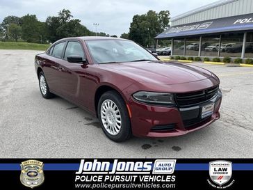 2023 Dodge Charger Police in a Octane Red Pearl Coat exterior color and Blackinterior. Police Pursuit Vehicles 877-473-5546 policepursuitvehicles.com 