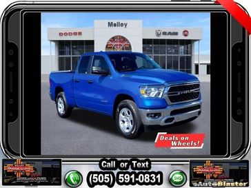 2024 RAM 1500 Big Horn Quad Cab 4x2 6'4' Box in a Hydro Blue Pearl Coat exterior color and Diesel Gray/Blackinterior. Melloy Dodge RAM FIAT 505-588-4459 melloydodge.com 