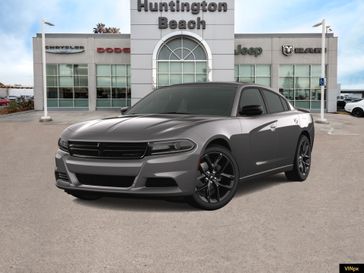 2023 Dodge Charger SXT in a Granite Pearl Coat exterior color and Blackinterior. BEACH BLVD OF CARS beachblvdofcars.com 