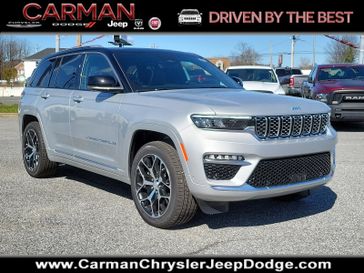 2024 Jeep Grand Cherokee Summit Reserve 4xe in a Silver Zynith exterior color and Global Blackinterior. Carman Chrysler Jeep Dodge Ram 302-317-2378 carmanchryslerjeepdodge.com 