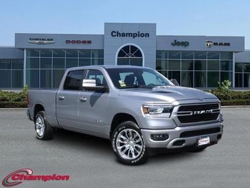 2024 RAM 1500 Laramie Crew Cab 4x4 6'4' Box in a Billet Silver Metallic Clear Coat exterior color and LEATHER TRIMinterior. Champion Chrysler Jeep Dodge Ram 800-549-1084 pixelmotiondemo.com 