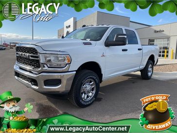 2024 RAM 2500 Tradesman Crew Cab 4x4 6'4' Box in a Bright White Clear Coat exterior color and Blackinterior. Legacy Auto Center 620-315-9264 legacyautocenter.net 