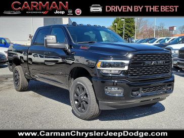 2024 RAM 2500 Big Horn Crew Cab 4x4 6'4' Box in a Diamond Black Crystal Pearl Coat exterior color. Carman Chrysler Jeep Dodge Ram 302-317-2378 carmanchryslerjeepdodge.com 