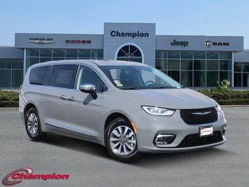 2023 Chrysler Pacifica Plug-in Hybrid Limited in a Ceramic Gray Clear Coat exterior color and NAPPA LEATHERinterior. Champion Chrysler Jeep Dodge Ram 800-549-1084 pixelmotiondemo.com 