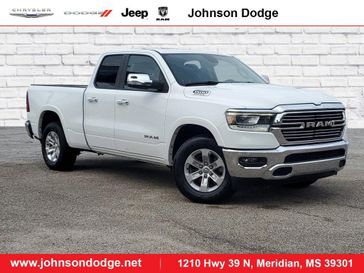 2020 RAM 1500 Laramie in a Bright White Clear Coat exterior color and Blackinterior. Johnson Dodge 601-693-6343 pixelmotiondemo.com 