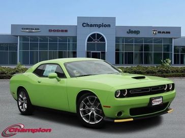 2023 Dodge Challenger Gt in a Sublime exterior color and HOUNDSTOOTHinterior. Champion Chrysler Jeep Dodge Ram 800-549-1084 pixelmotiondemo.com 