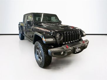 2023 Jeep Gladiator Rubicon 4x4 in a Black Clear Coat exterior color and Dark Saddle/Blackinterior. Sheridan Motors Auto (307) 218-2217 sheridanmotors.com 