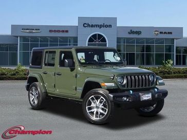 2024 Jeep Wrangler 4-door Sport S 4xe in a Sarge Green Clear Coat exterior color and CLOTHinterior. Champion Chrysler Jeep Dodge Ram 800-549-1084 pixelmotiondemo.com 