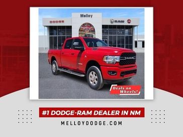 2024 RAM 2500 Big Horn Crew Cab 4x4 6'4' Box in a Flame Red Clear Coat exterior color and Blackinterior. Melloy Dodge RAM FIAT 505-588-4459 melloydodge.com 