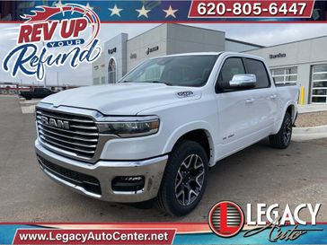 2025 RAM 1500 Laramie Crew Cab 4x4 5'7' Box in a Bright White Clear Coat exterior color and Blackinterior. Legacy Auto Center 620-315-9264 legacyautocenter.net 