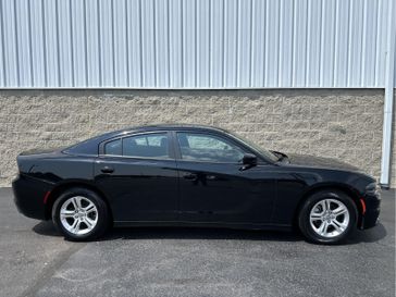 2022 Dodge Charger SXT in a Pitch Black Clear Coat exterior color and Blackinterior. Wilmington Auto Center Chrysler Dodge Jeep Ram (937) 556-6430 wilmingtonautocentercdjr.com 