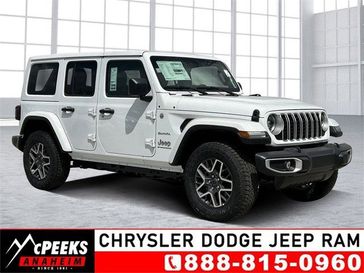 Jeep Wrangler 4xE Sahara in a Bright White Clear Coat exterior color and Blackinterior. McPeek's Chrysler Dodge Jeep Ram of Anaheim 888-861-6929 mcpeeksdodgeanaheim.com 