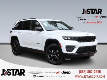 2023 Jeep Grand Cherokee Altitude 4x4 in a Bright White Clear Coat exterior color and Global Blackinterior. J Star Chrysler Dodge Jeep Ram of Anaheim Hills 888-802-2956 jstarcdjrofanaheimhills.com 