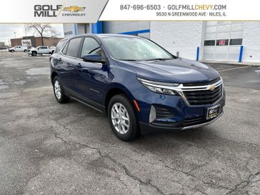 2022 Chevrolet Equinox LT in a Blue Glow Metallic exterior color and Jet Blackinterior. Glenview Luxury Imports 847-904-1233 glenviewluxuryimports.com 