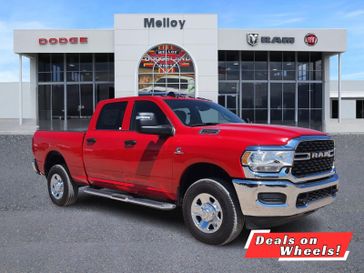 2024 RAM 2500 Tradesman Crew Cab 4x4 6'4' Box in a Flame Red Clear Coat exterior color. Melloy Dodge RAM FIAT 505-588-4459 melloydodge.com 