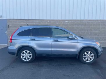 2007 Honda CR-V EX-L in a Royal Blue Pearl exterior color and Blackinterior. Wilmington Auto Center Chrysler Dodge Jeep Ram (937) 556-6430 wilmingtonautocentercdjr.com 