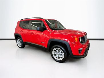2023 Jeep Renegade Latitude 4x4 in a Colorado Red Clear Coat exterior color and Blackinterior. Sheridan Motors CDJR 307-218-2217 sheridanmotor.com 