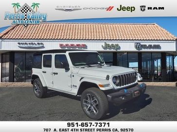 2024 Jeep Wrangler 4-door Sport S 4xe in a Bright White Clear Coat exterior color and Blackinterior. Perris Valley Chrysler Dodge Jeep Ram 951-355-1970 perrisvalleydodgejeepchrysler.com 